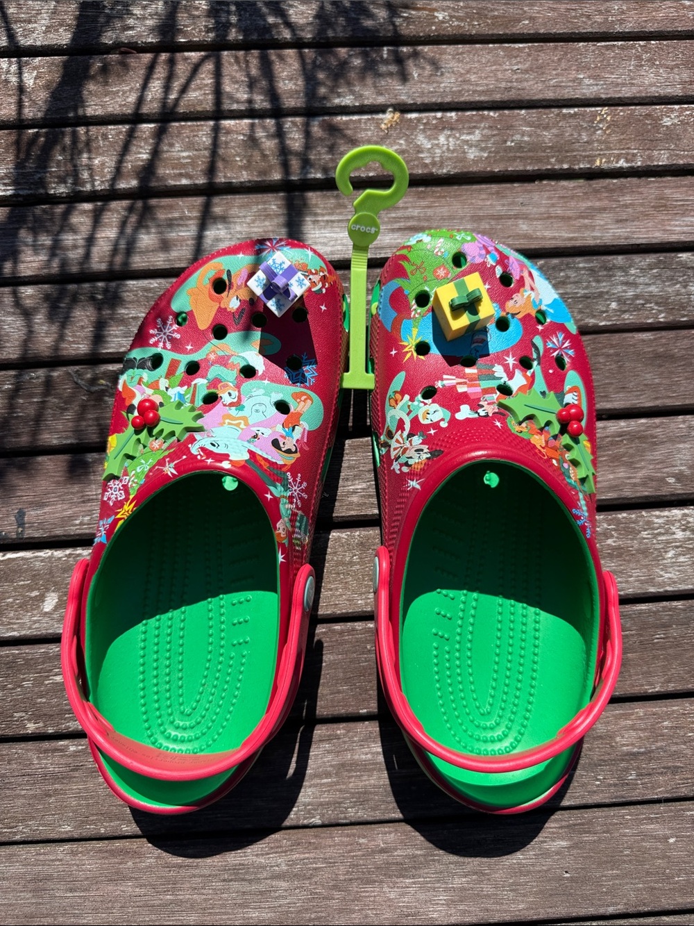 Disney Christmas CROCS with presents attached to toe. NEW